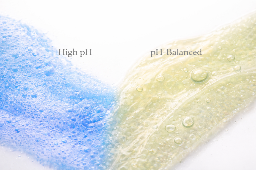 Close-up texture comparison of high pH foaming cleanser and pH-balanced gel cleanser on white background for oily and acne-prone skin.